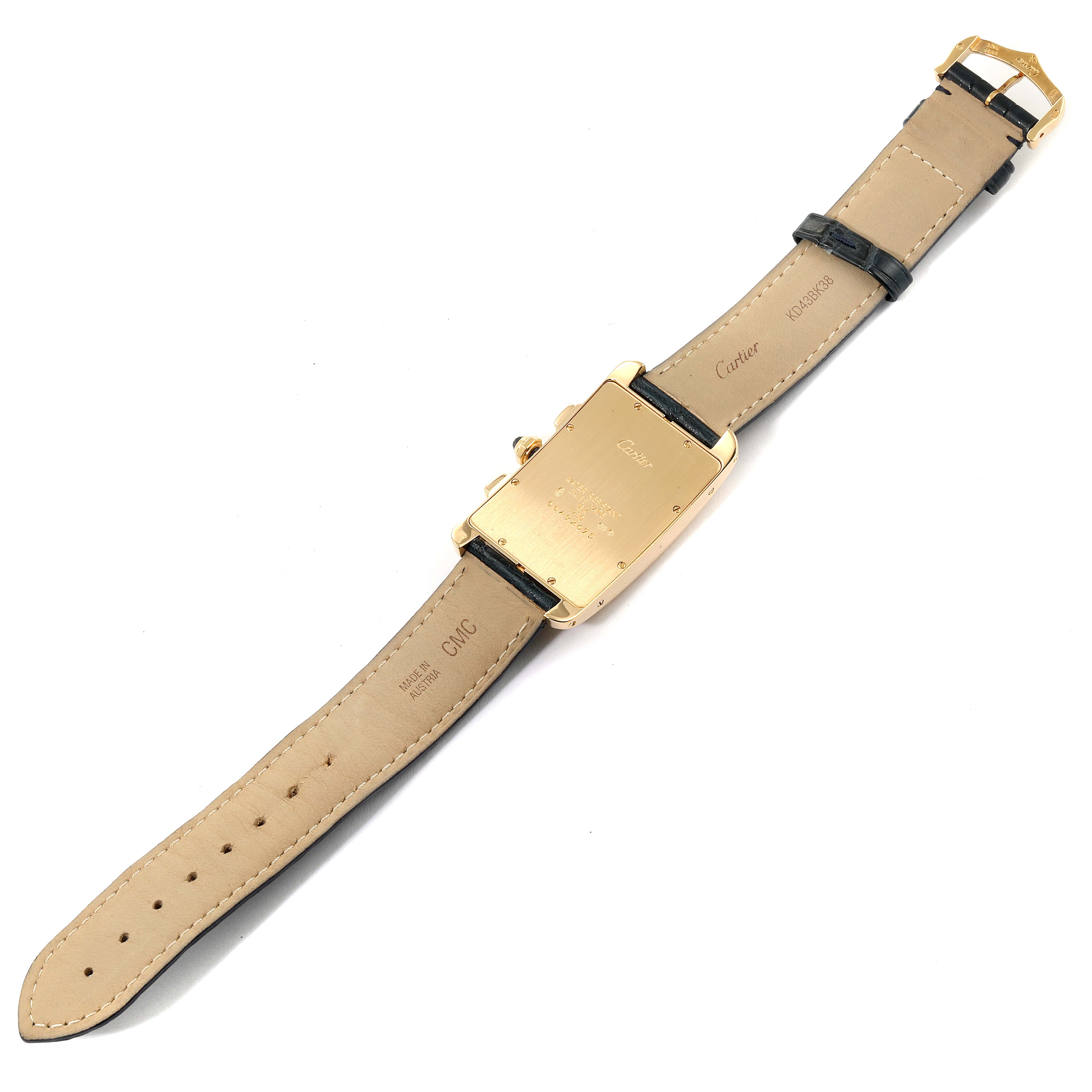 The image shows the back of a Tank Americaine model by Cartier, highlighting the strap and caseback.