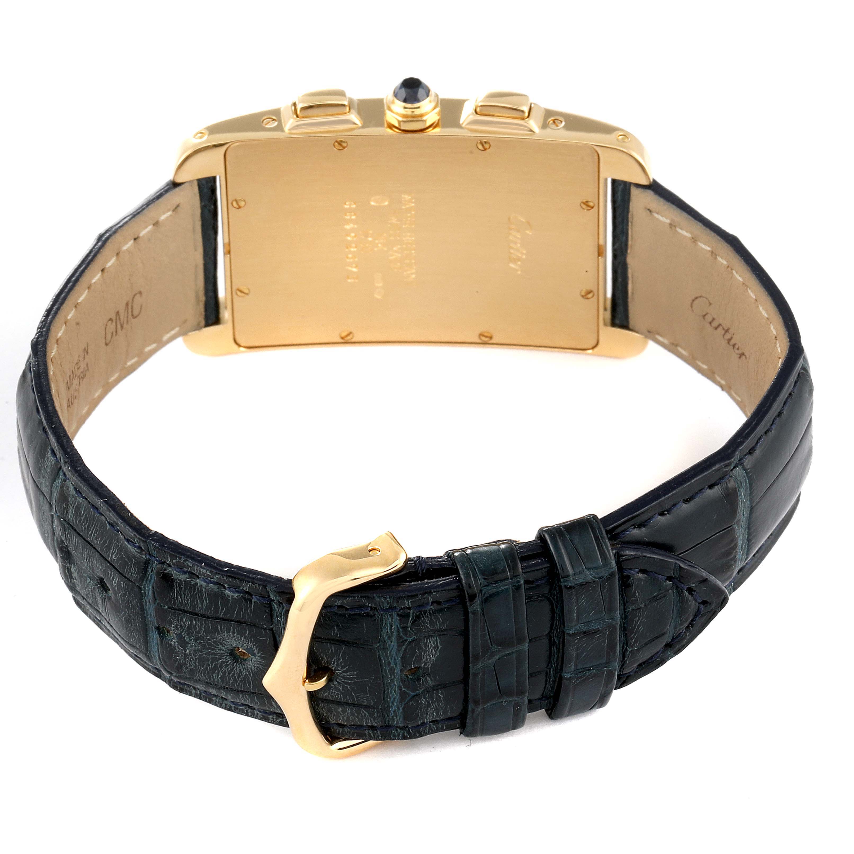 This image shows the back view of the Cartier Tank Americaine W2601156 Men's Yellow Gold Silver Dial W2601156 Men's Yellow Gold Silver Dial watch, focusing on the gold case, strap, and buckle.