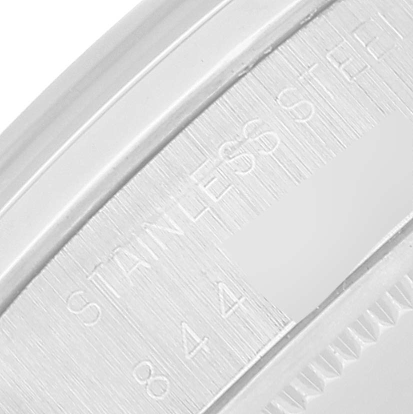 This close-up shows the case back and part of the serial number area on a Rolex Date 6694 Men's Stainless Steel Black Dial 6694 Men's Stainless Steel Black Dial model watch.