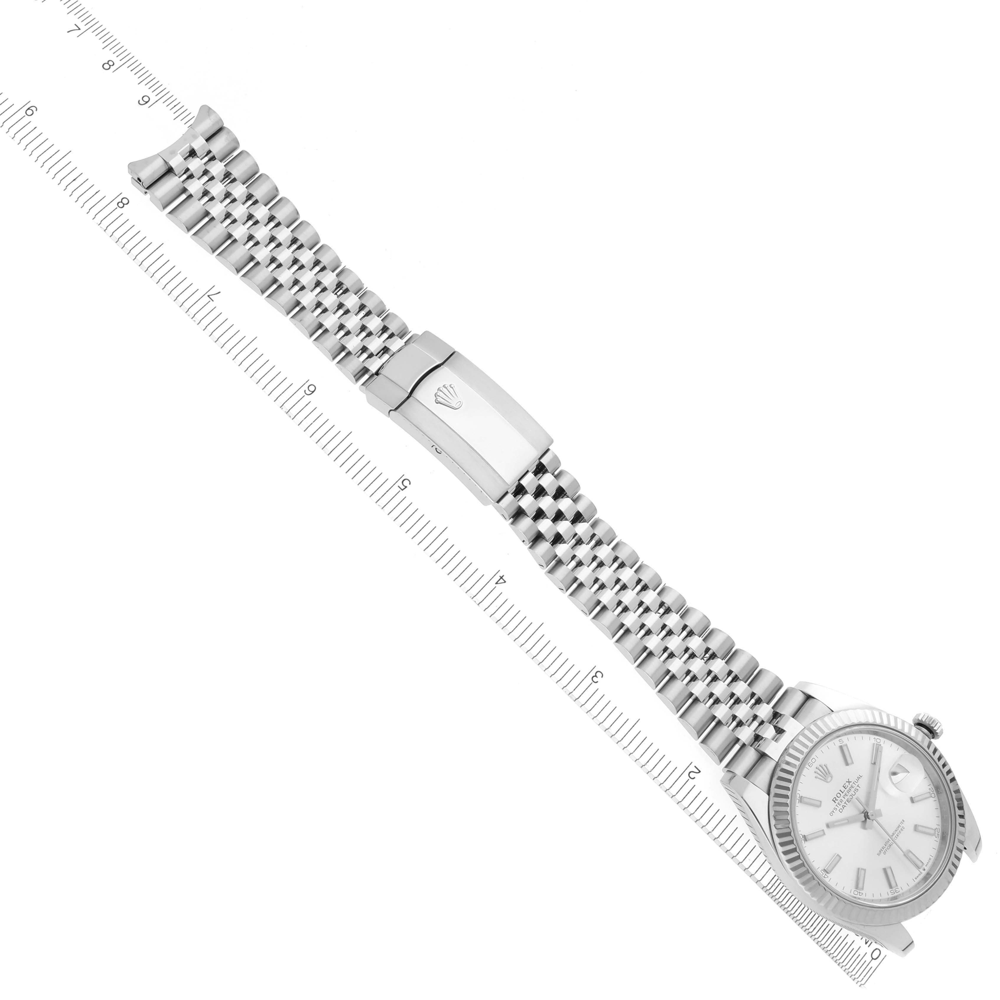 The Rolex Datejust 41 126334 Men's Stainless Steel Silver Dial 126334 Men's Stainless Steel Silver Dial is shown from a top-down angle, featuring the full bracelet, clasp, and partial view of the dial.