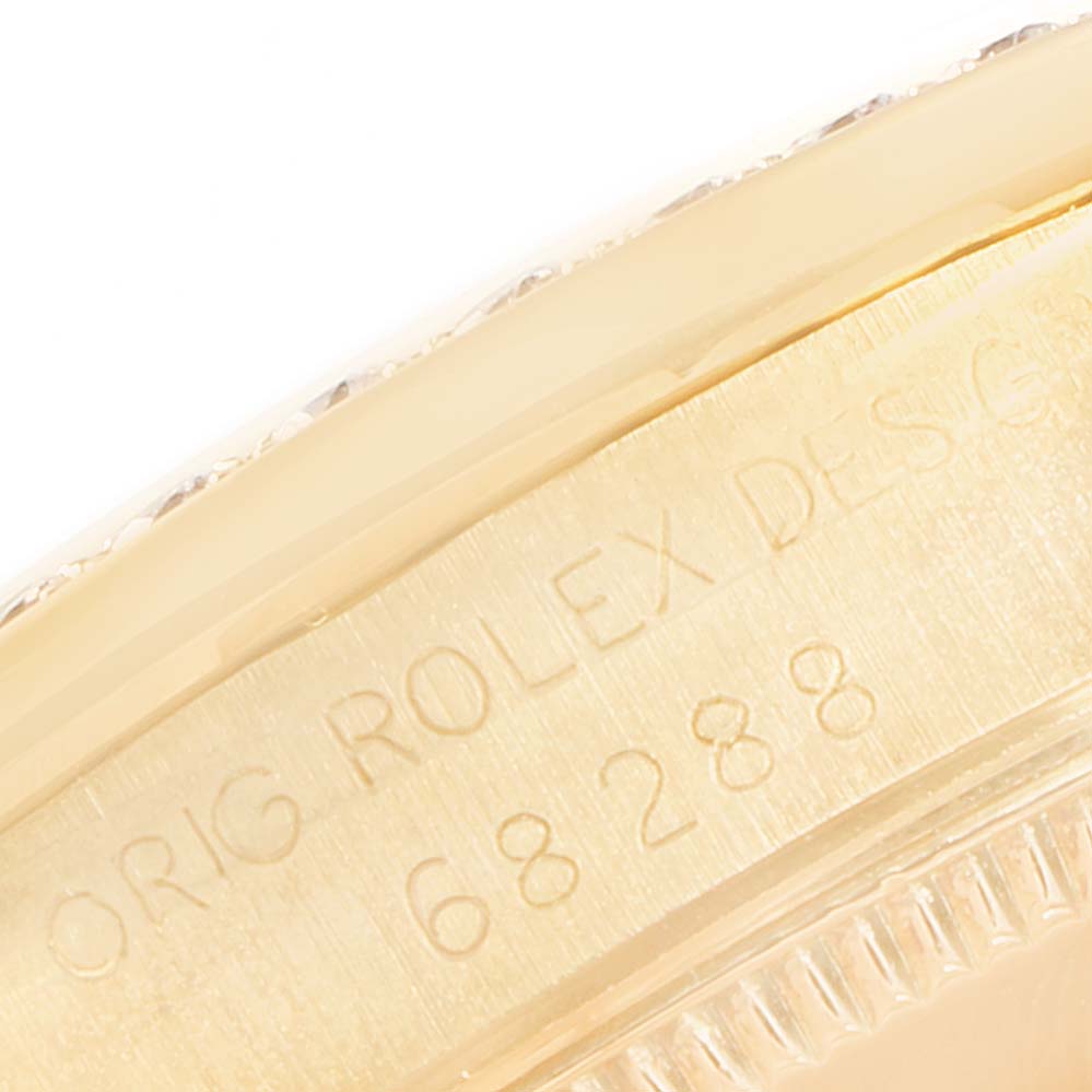 The image shows a close-up of the engraved case back rim of a Rolex President 68288 Women's White Gold Champagne Dial 68288 Women's White Gold Champagne Dial model, displaying part of the serial number.