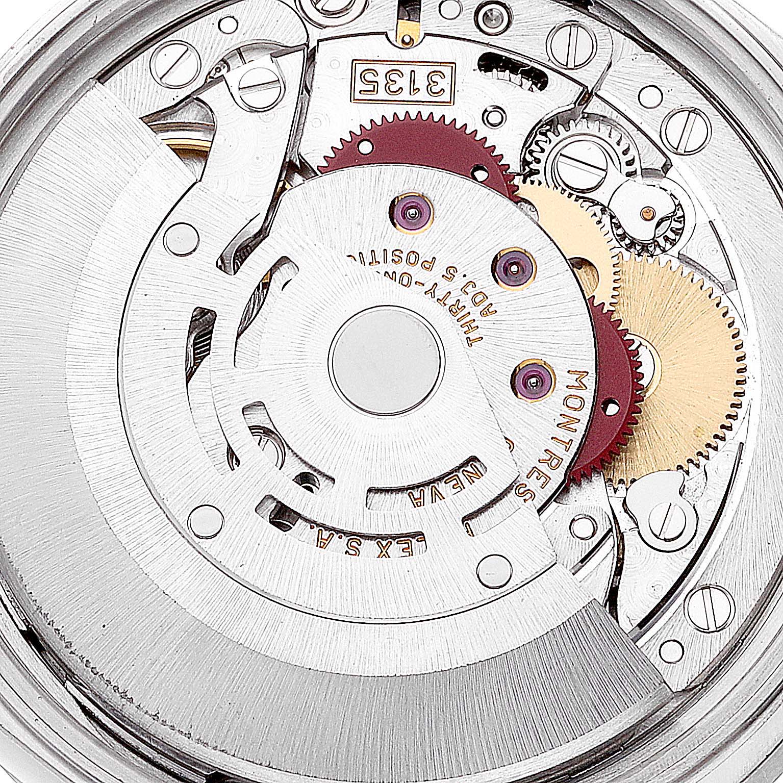 This image shows a close-up view of the internal mechanism of a Rolex Date 15210 Men's Stainless Steel Blue Dial 15210 Men's Stainless Steel Blue Dial model watch.