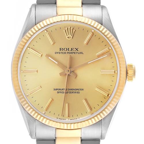 The Rolex Vintage Collection 1005 Men's Steel and Gold (two tone) Champagne Dial 1005 Men's Steel and Gold (two tone) Champagne Dial watch is shown from the front, highlighting its gold dial, hands, and the fluted bezel.
