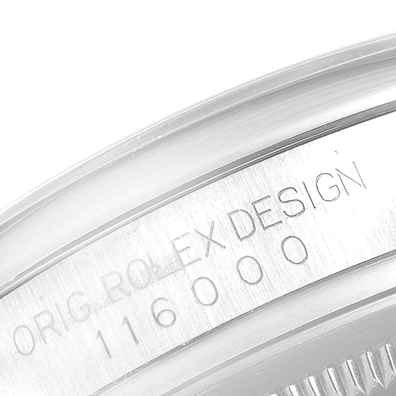 The image shows a close-up of the caseback engravings of a Rolex Oyster Perpetual 116000 Men's Stainless Steel Grey Dial 116000 Men's Stainless Steel Grey Dial model, displaying the text "ORG. ROLEX DESIGN" and the model number "116000".