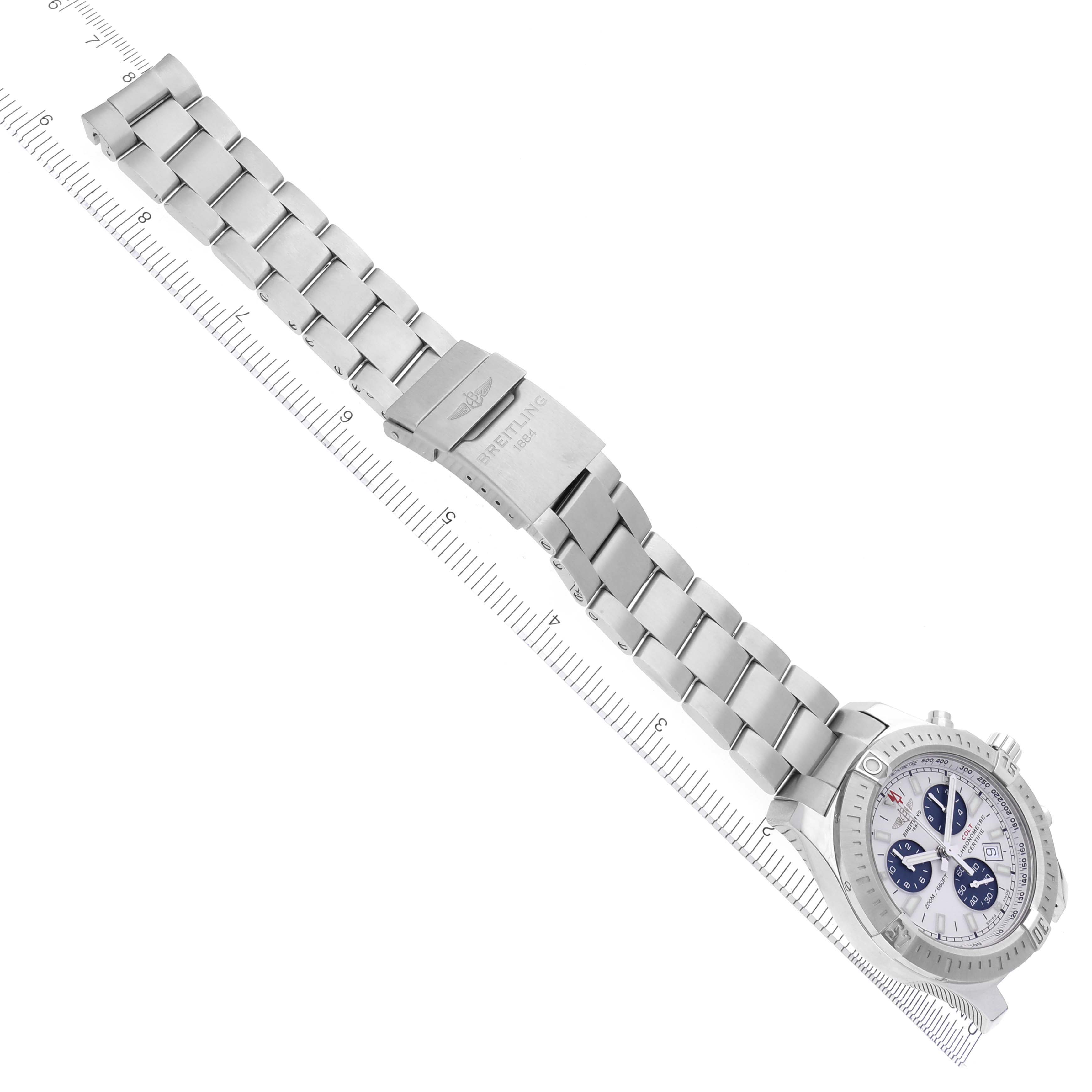 The Breitling Colt A73388 Men's Stainless Steel White Dial A73388 Men's Stainless Steel White Dial watch is shown at an angle, displaying the bracelet, clasp, and partial view of the face.