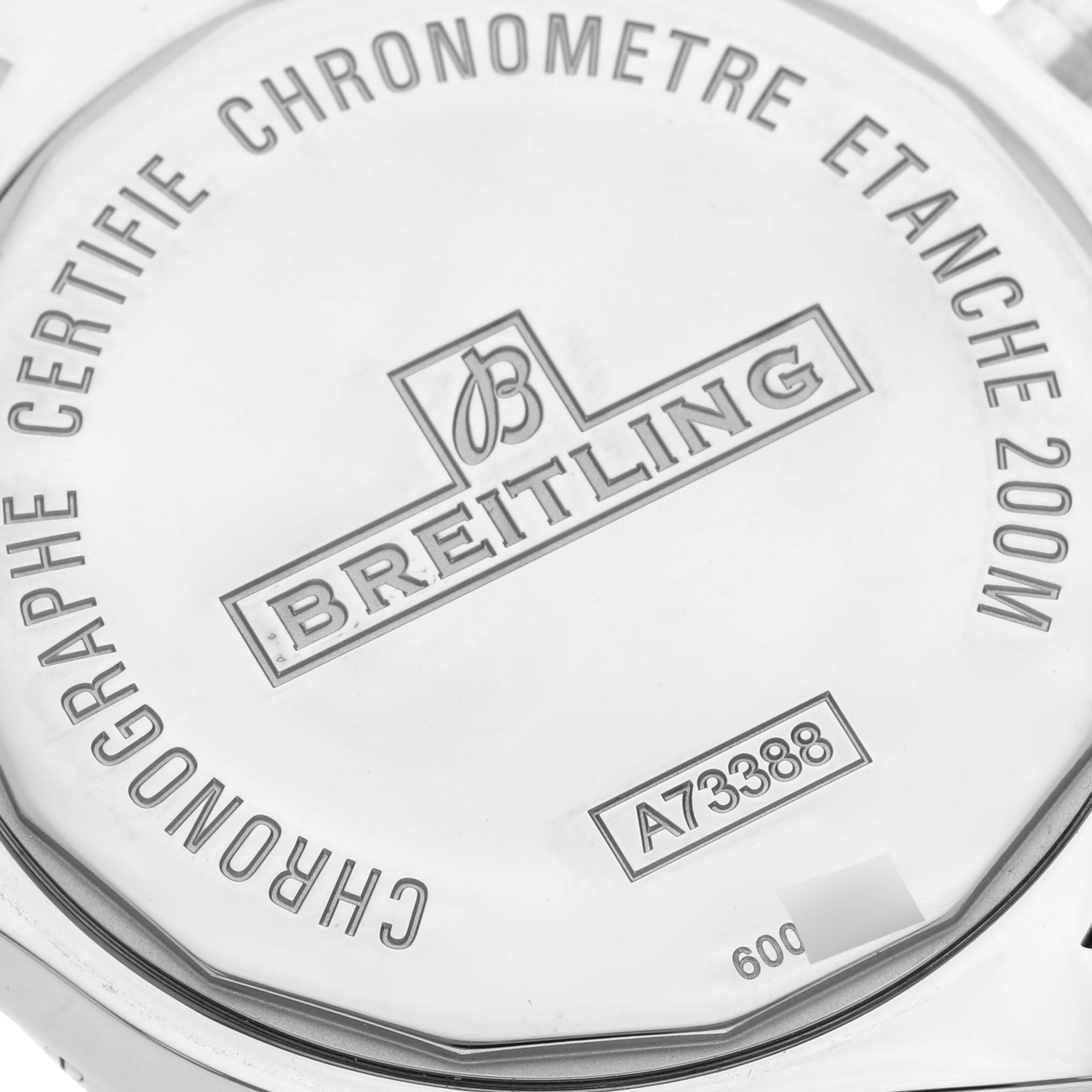 The image shows the back case of the Breitling Colt A73388 Men's Stainless Steel White Dial A73388 Men's Stainless Steel White Dial watch, displaying model details and branding.