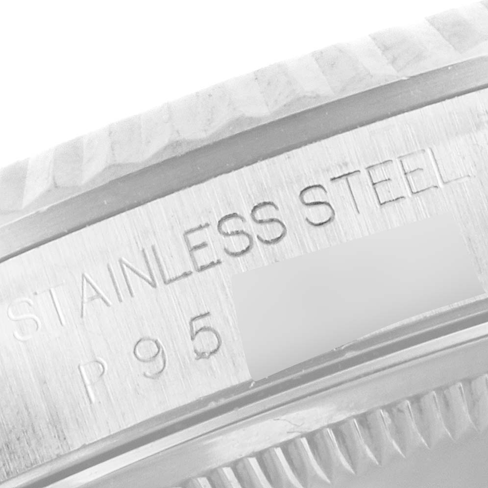 This is a close-up of the outer case and bezel of a Rolex Datejust 16234 Men's Stainless Steel Mother of Pearl Dial 16234 Men's Stainless Steel Mother of Pearl Dial, showing its stainless steel inscription.