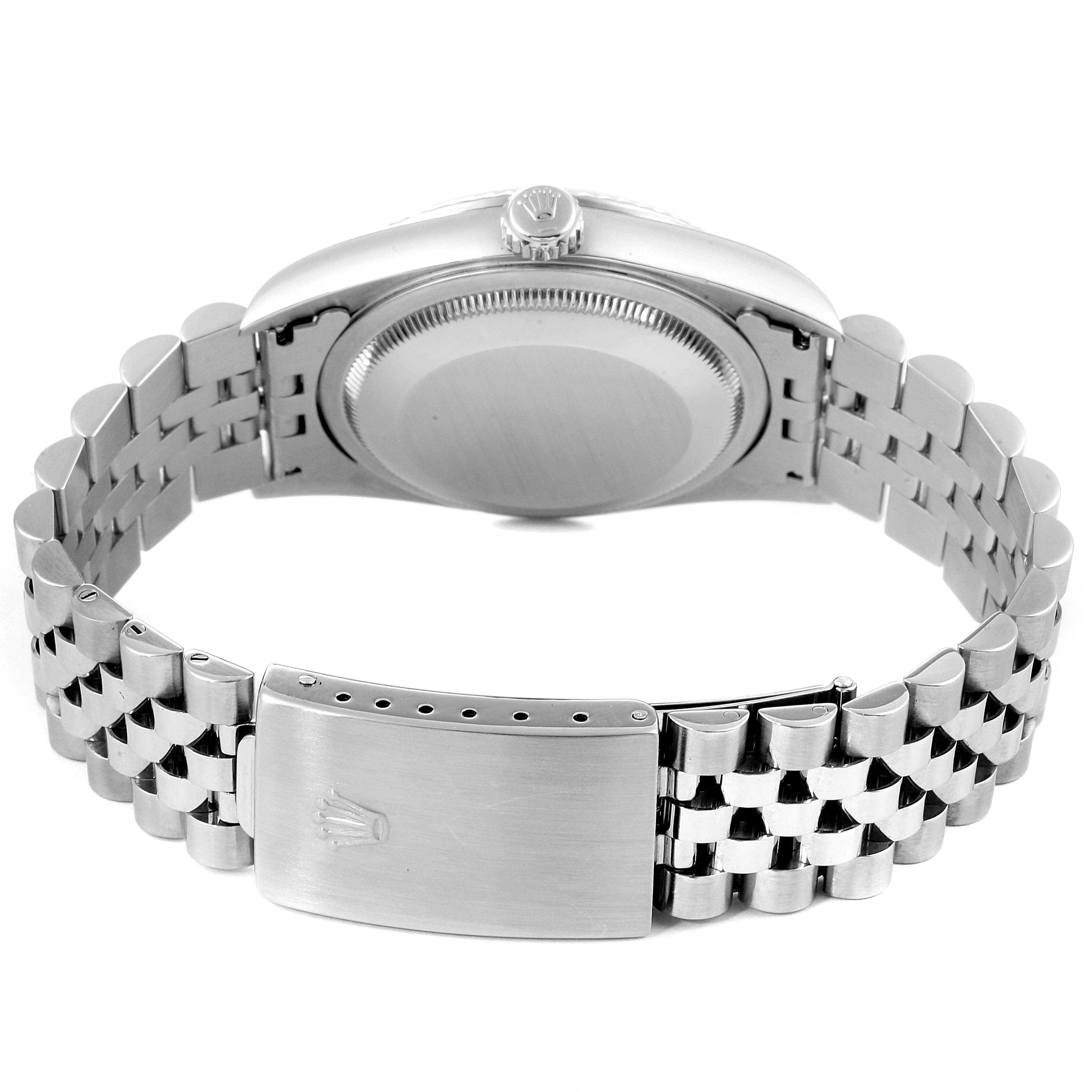 This Rolex Datejust 16234 Men's Stainless Steel Mother of Pearl Dial 16234 Men's Stainless Steel Mother of Pearl Dial watch is shown from the back, highlighting the case back, crown, and bracelet clasp.