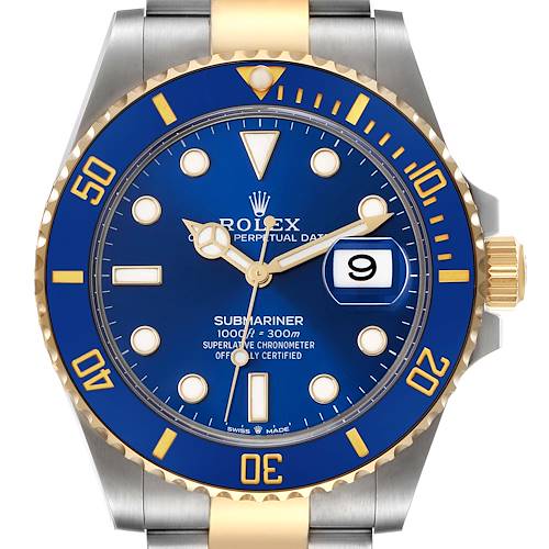 This close-up image of the Rolex Submariner 126613 Men's Steel and Gold (two tone) Blue Dial 126613 Men's Steel and Gold (two tone) Blue Dial watch shows the dial, hands, bezel, and part of the bracelet.