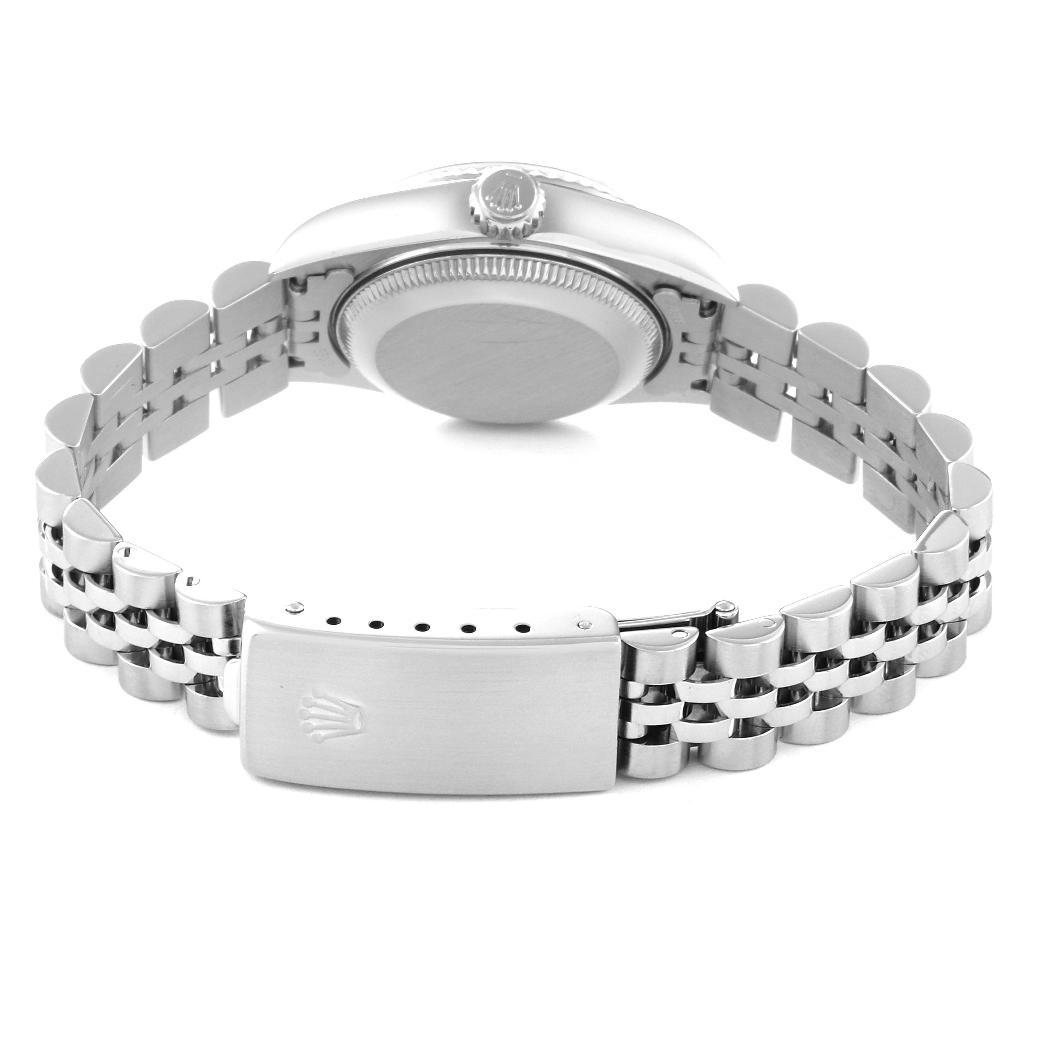 The image shows the back view of a Rolex Datejust 79174 Women's Stainless Steel Black Dial 79174 Women's Stainless Steel Black Dial watch, focusing on the stainless steel case back and bracelet clasp.