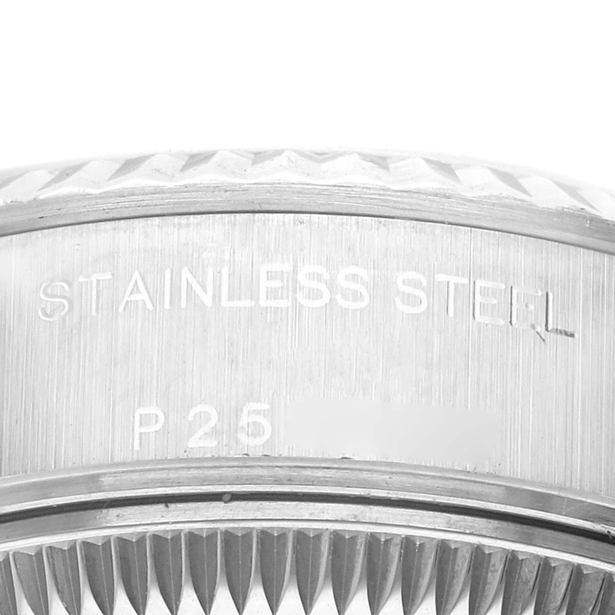 The image shows a close-up of the side of a Rolex Datejust 79174 Women's Stainless Steel Black Dial 79174 Women's Stainless Steel Black Dial watch case, highlighting the stainless steel material and part of the fluted bezel.