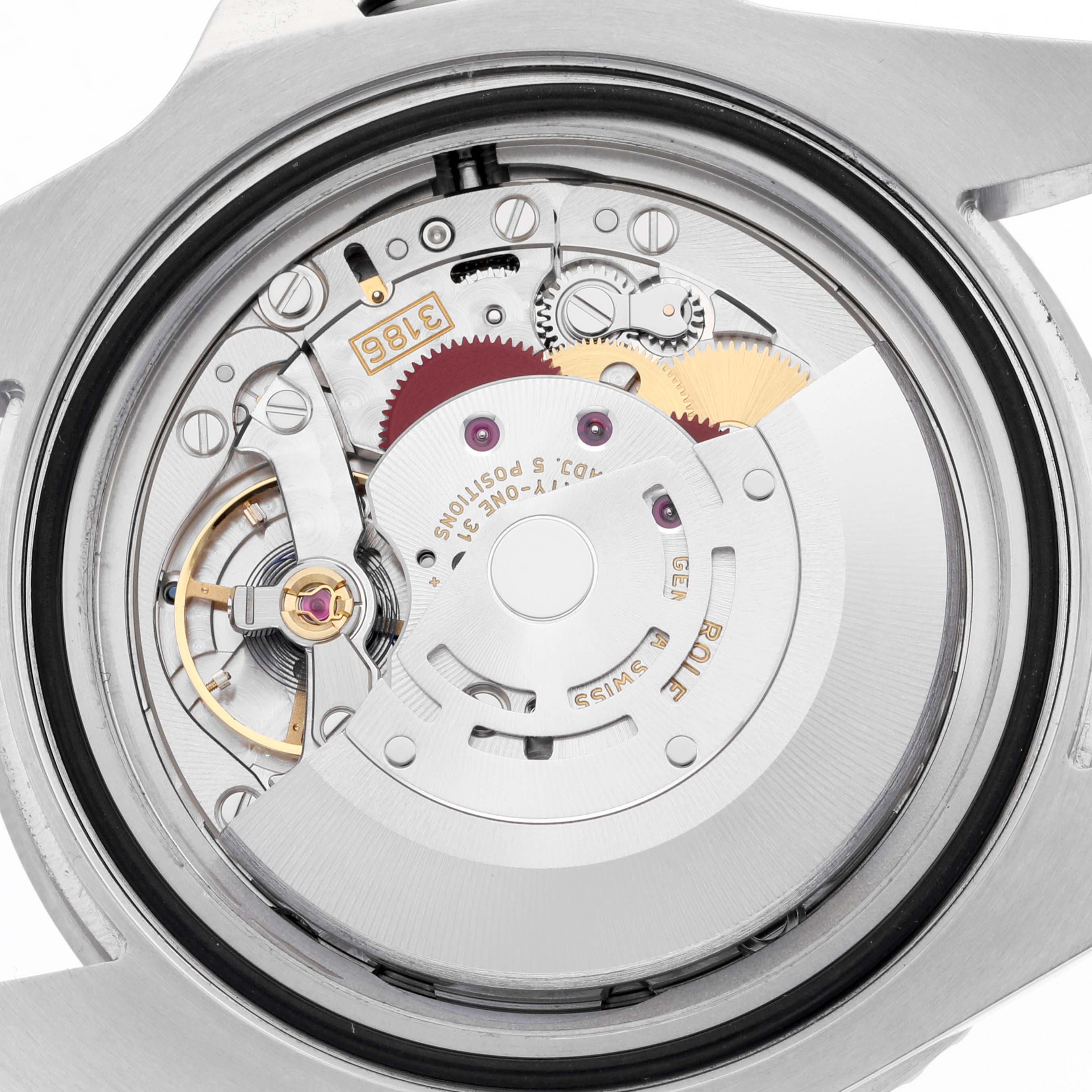 The image shows the Rolex GMT-Master 116710LN Men's Stainless Steel Black Dial 116710LN Men's Stainless Steel Black Dial's movement from a back angle, highlighting the rotor and gears.