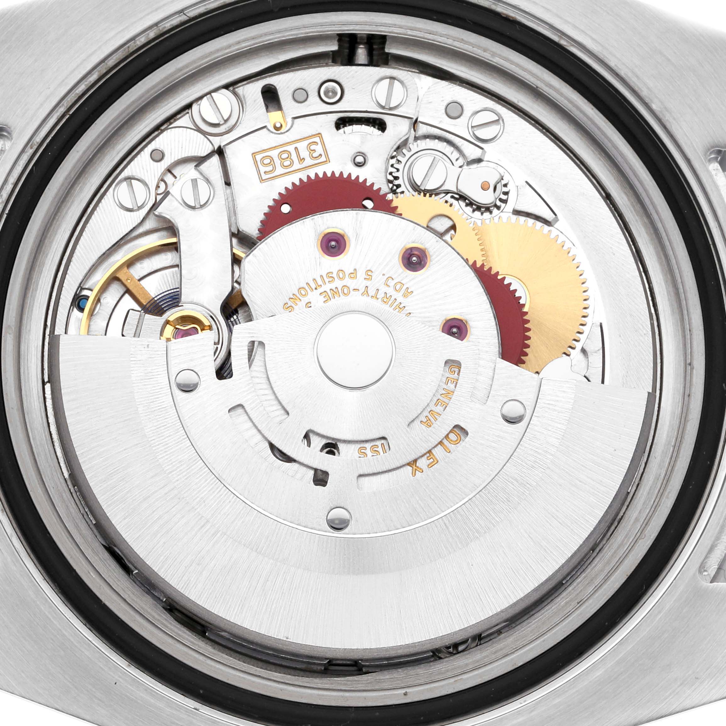 The image shows the movement of a Rolex GMT-Master 116710LN Men's Stainless Steel Black Dial 116710LN Men's Stainless Steel Black Dial watch from the back angle, revealing gears and components.