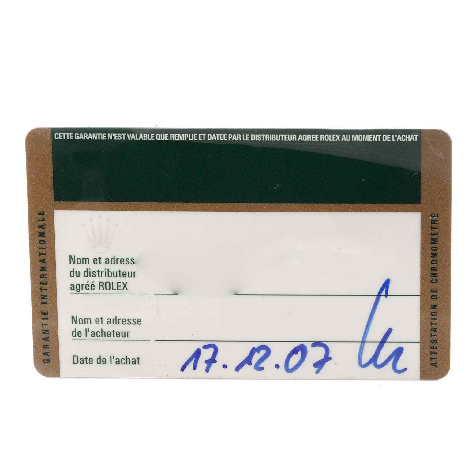 The image shows a warranty card for the Rolex GMT-Master 116710LN Men's Stainless Steel Black Dial 116710LN Men's Stainless Steel Black Dial model, viewed from the top, with handwritten details visible.