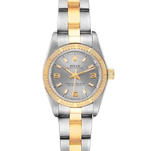 The image shows a front view of a Rolex Oyster Perpetual 76243 Women's Steel and Gold (two tone) Silver Dial 76243 Women's Steel and Gold (two tone) Silver Dial watch, highlighting its dial, bezel, and two-tone bracelet.