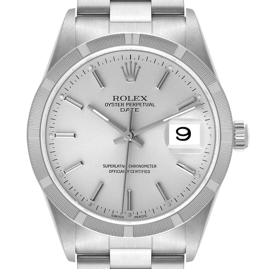 This image shows the face and bezel of the Rolex Oyster Perpetual Date watch from a front angle.