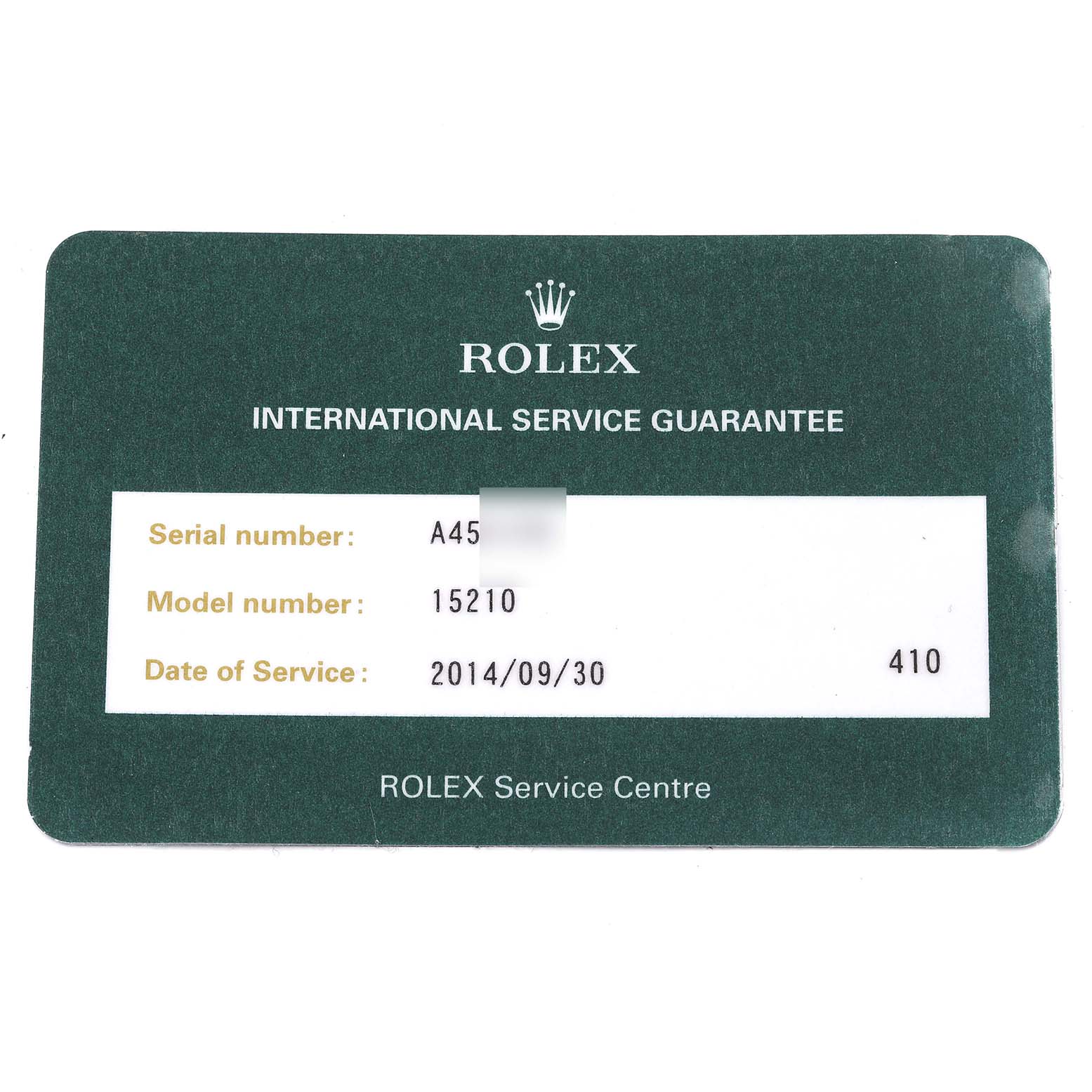 This image shows the front of a Rolex International Service Guarantee card for a Rolex Date 15210 Men's Stainless Steel Silver Dial 15210 Men's Stainless Steel Silver Dial model 15210.