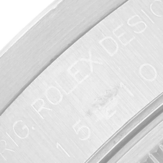 This image shows a close-up of the side engraving on the Rolex Date 15210 Men's Stainless Steel Silver Dial 15210 Men's Stainless Steel Silver Dial model watch.