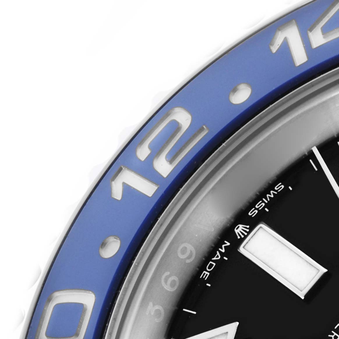 The image shows a close-up of the bezel and dial edge of a Rolex GMT-Master 126710BLNR Men's Stainless Steel Black Dial 126710BLNR Men's Stainless Steel Black Dial, highlighting the blue section and hour markers.