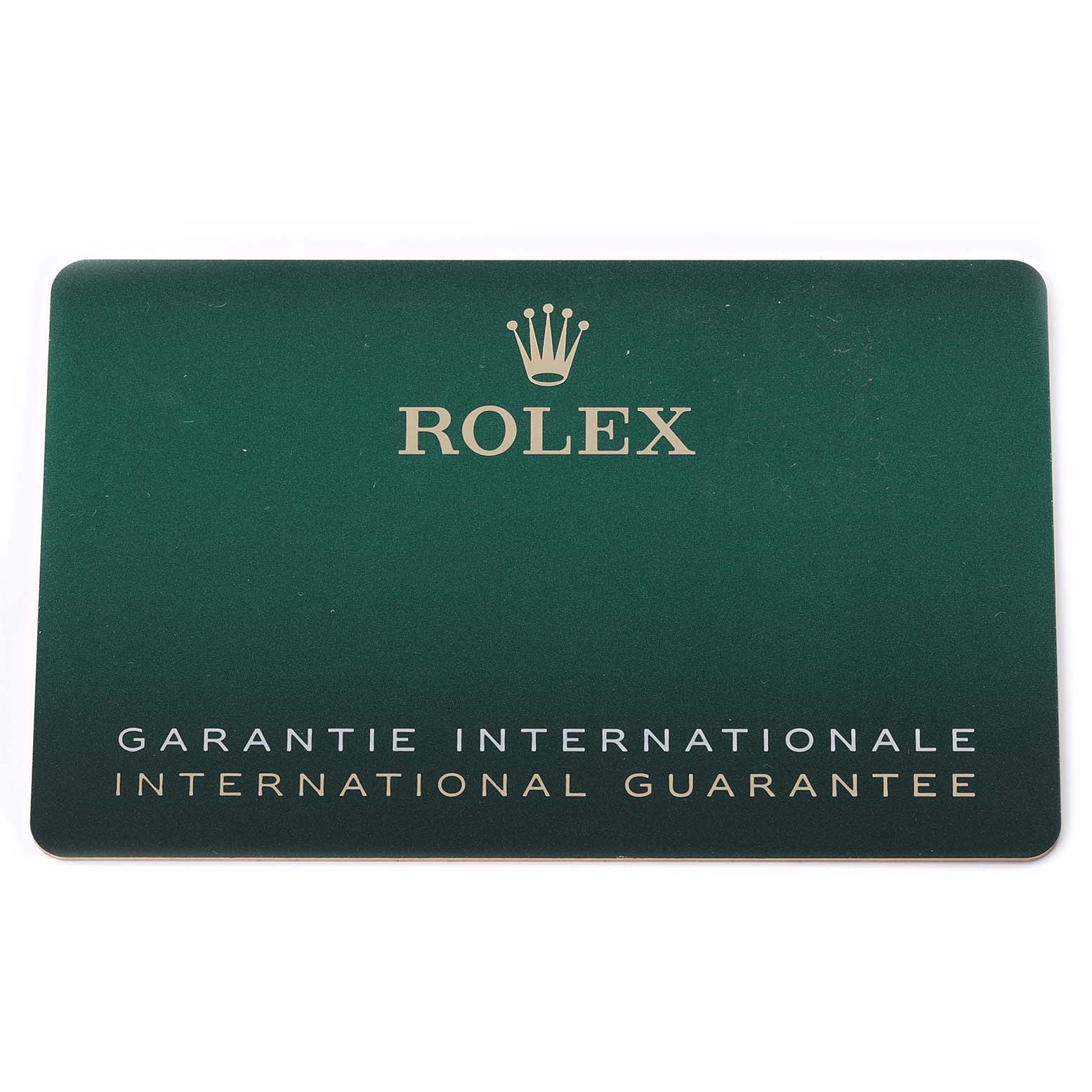 The image shows a Rolex international guarantee card, not the Rolex GMT-Master 126710BLNR Men's Stainless Steel Black Dial 126710BLNR Men's Stainless Steel Black Dial watch itself.