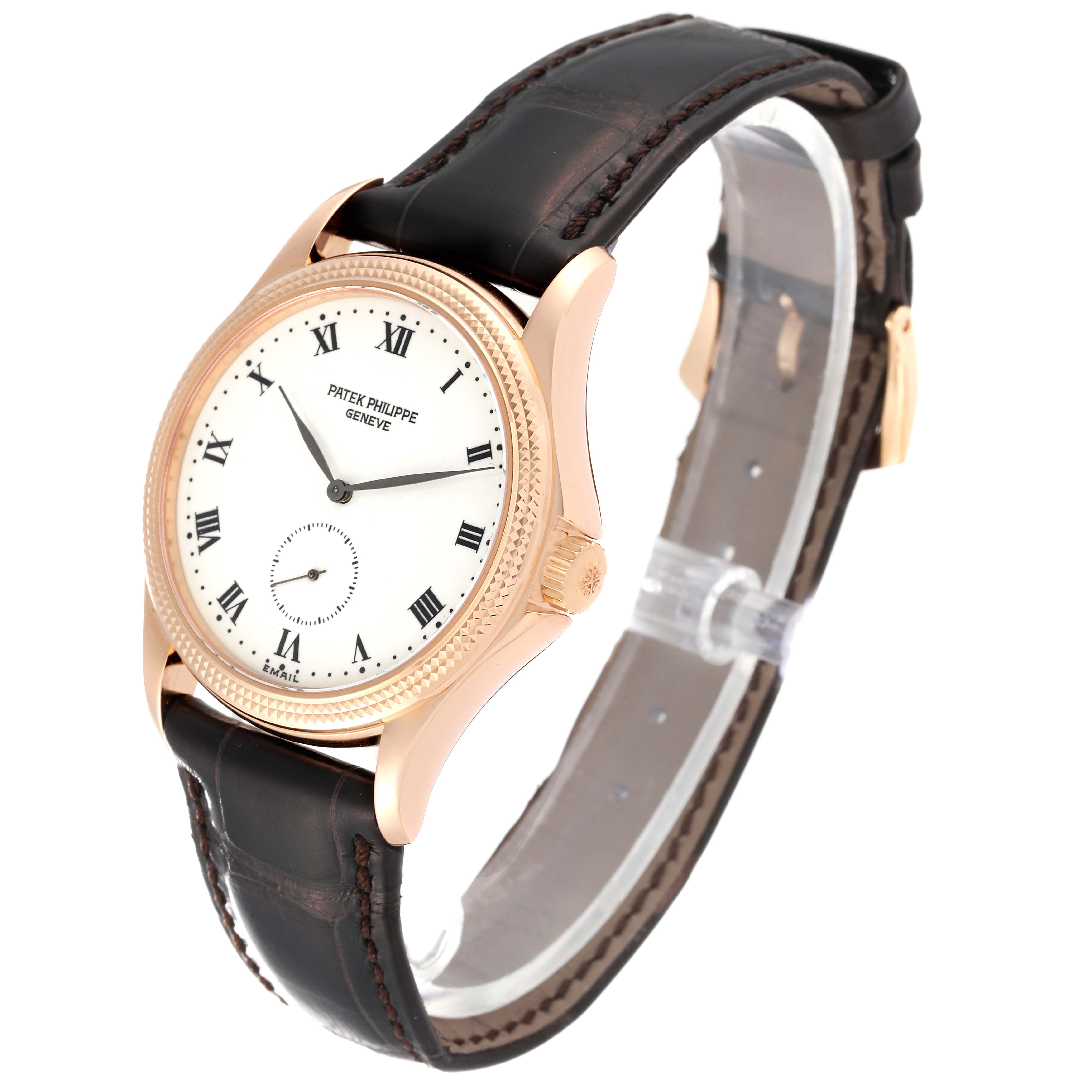 The image shows a Patek Philippe Calatrava 5115R-001 Men's Rose Gold White Dial 5115R-001 Men's Rose Gold White Dial watch angled from the front left, highlighting its dial, case, and leather strap.