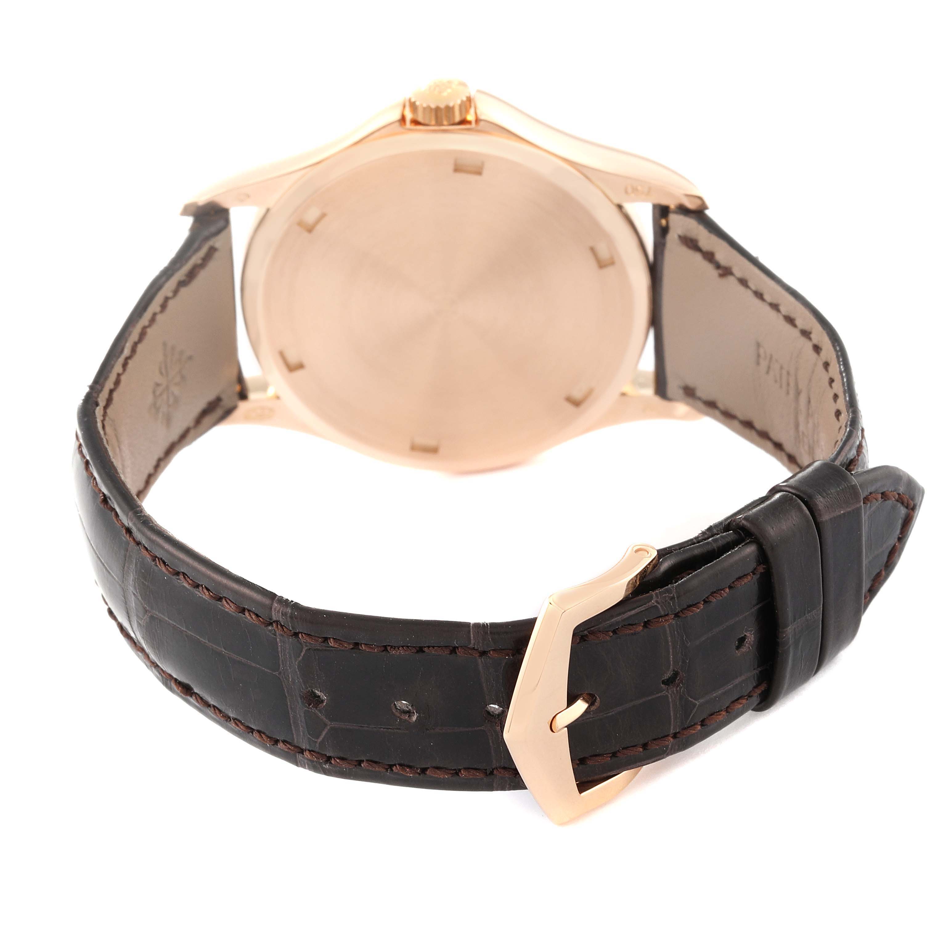 The image shows the rear view of a Patek Philippe Calatrava 5115R-001 Men's Rose Gold White Dial 5115R-001 Men's Rose Gold White Dial watch, highlighting the case back, strap, and buckle.