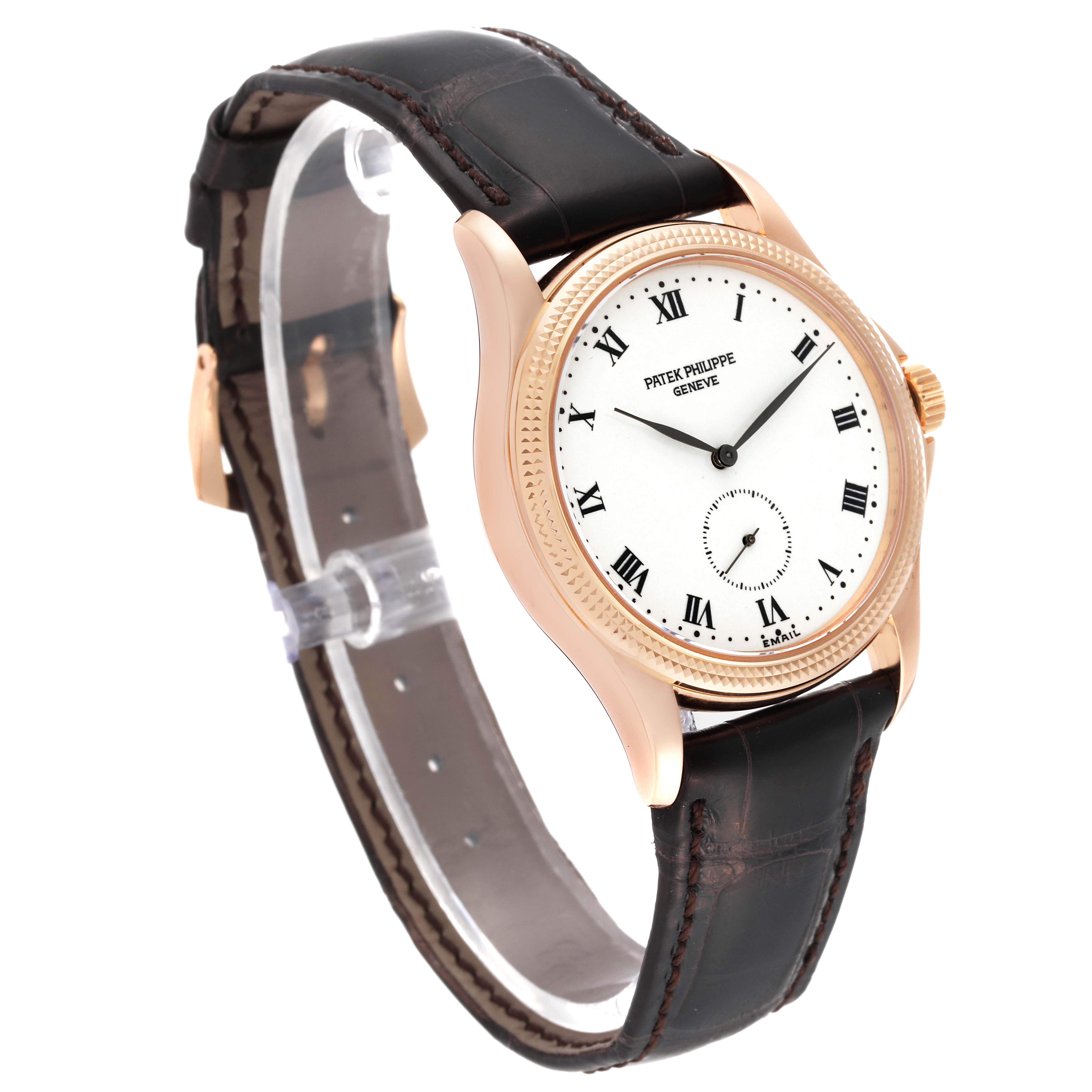 The image shows a Patek Philippe Calatrava 5115R-001 Men's Rose Gold White Dial 5115R-001 Men's Rose Gold White Dial watch in a three-quarter angle, highlighting its face, dial, and leather strap.