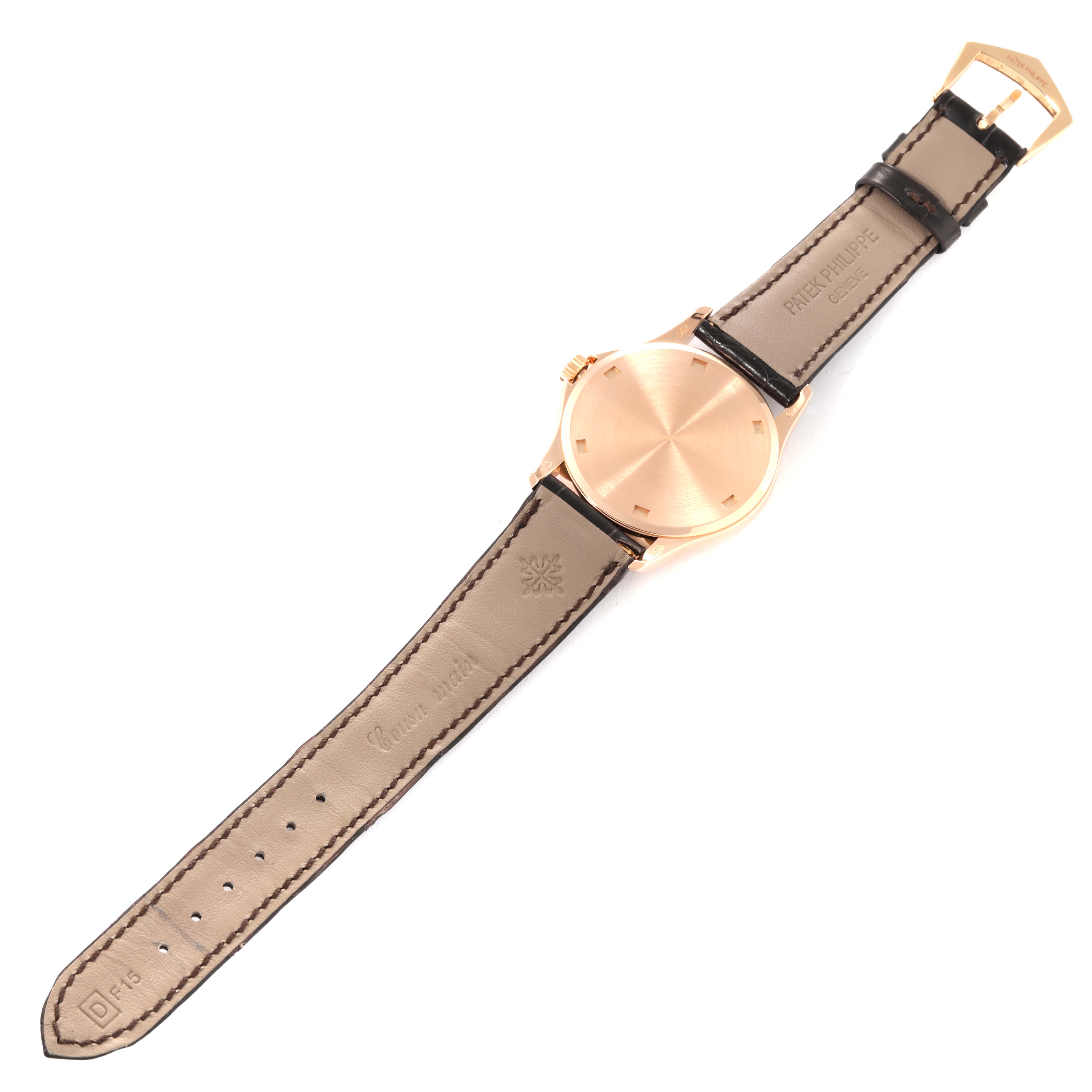 The image shows the back and strap of a Patek Philippe Calatrava 5115R-001 Men's Rose Gold White Dial 5115R-001 Men's Rose Gold White Dial watch laid flat.