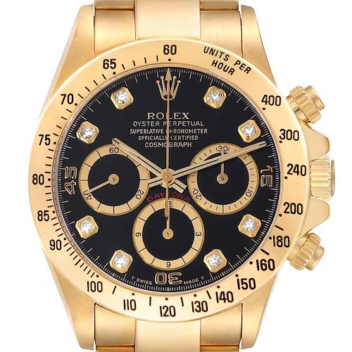 This image shows a frontal view of a Rolex Daytona 16528G Men's Yellow Gold Black Dial 16528G Men's Yellow Gold Black Dial watch, highlighting its black dial, multiple subdials, and gold casing.