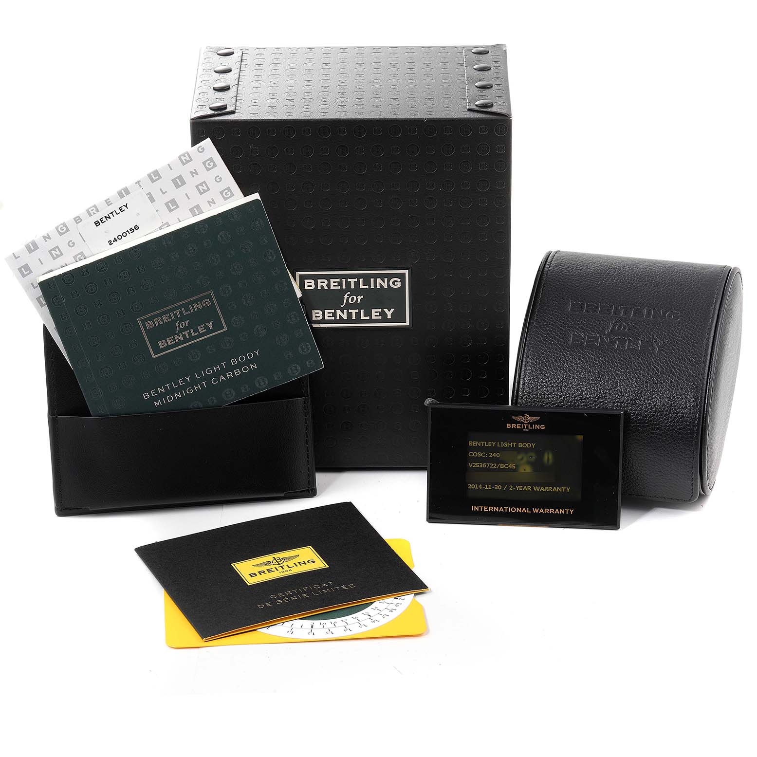 The image shows packaging and accessories for the Breitling Bentley V25367 Men's Titanium Black Dial V25367 Men's Titanium Black Dial model, including a box, leather pouch, manuals, and warranty card.
