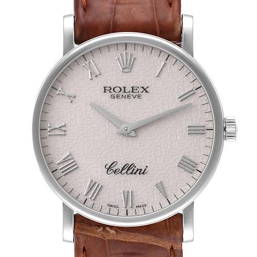 This image shows a Rolex Cellini 5115/9 Men's White Gold Beige Dial 5115/9 Men's White Gold Beige Dial watch face, crown, and part of the brown leather strap from a straight-on angle.