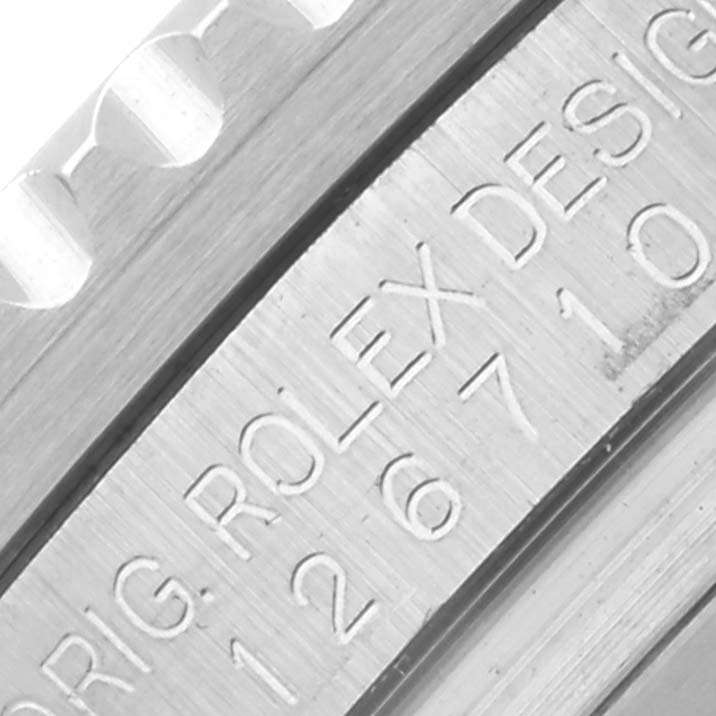 The image shows a close-up of the side engraving and bezel edge of a Rolex GMT-Master 68251 Men's Stainless Steel Black Dial 68251 Men's Stainless Steel Black Dial watch.