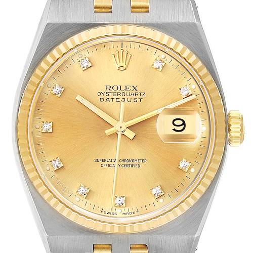This is a close-up of the Rolex Oysterquartz 17013 Men's Steel and Gold (two tone) Champagne Dial 17013 Men's Steel and Gold (two tone) Champagne Dial Datejust watch, showing the dial, hands, bezel, and part of the bracelet.