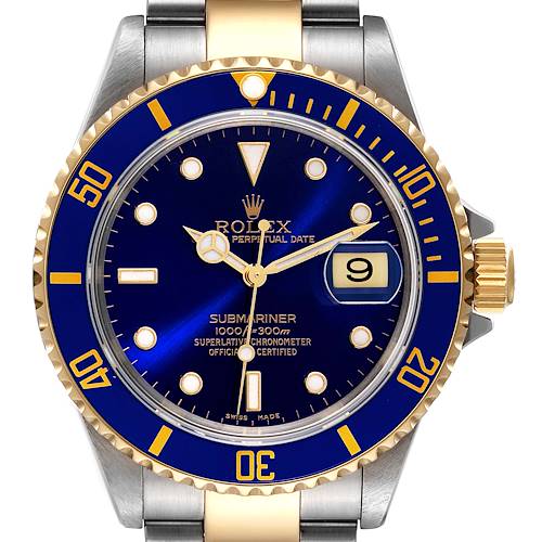 The image shows a close-up of the Rolex Submariner 16613 Men's Steel and Gold (two tone) Blue Dial 16613 Men's Steel and Gold (two tone) Blue Dial watch face and bezel, highlighting the crown and part of the bracelet.