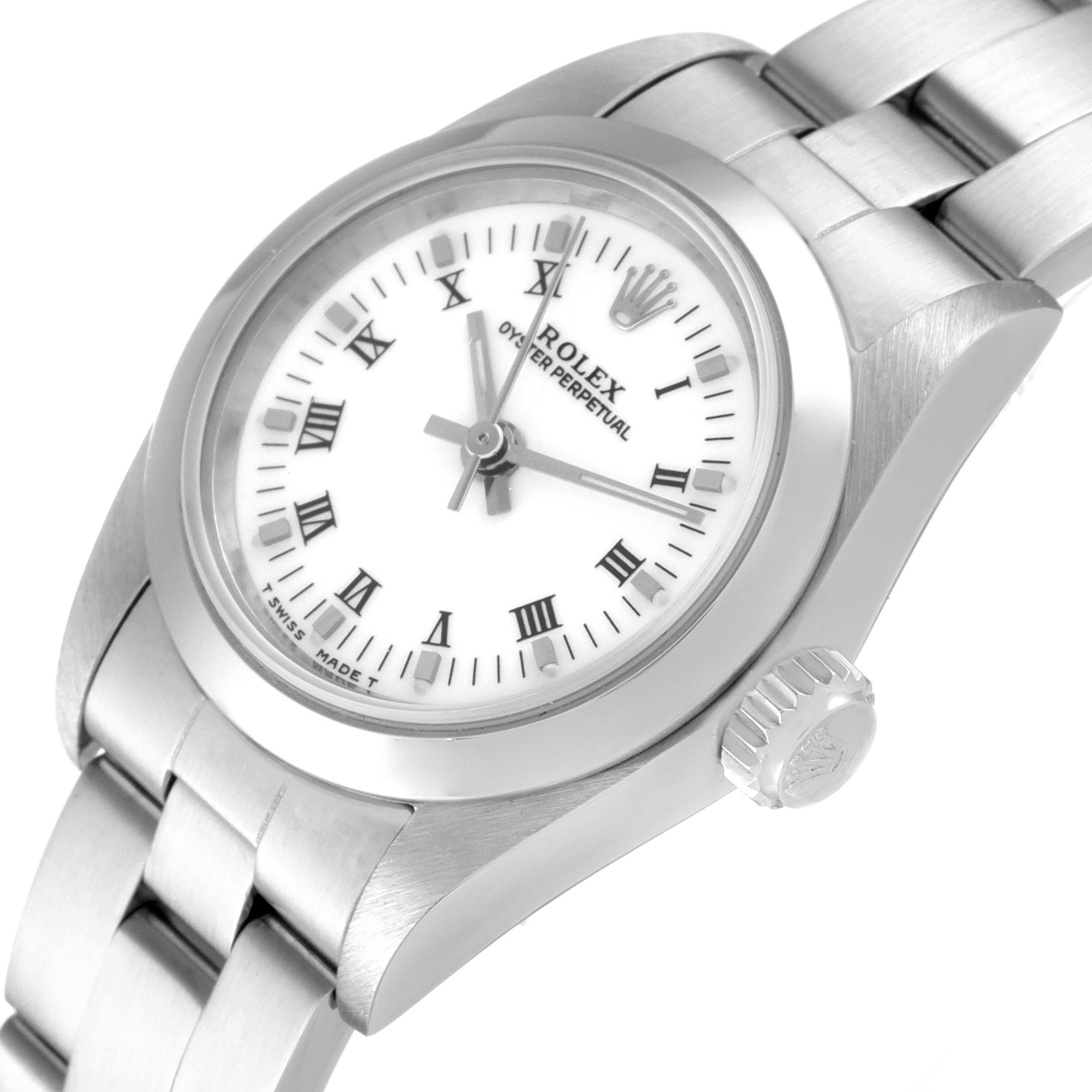 The image shows a close-up of the Rolex Oyster Perpetual 67180 Women's Stainless Steel White Dial 67180 Women's Stainless Steel White Dial watch's face, crown, and stainless steel bracelet from a slight angle.
