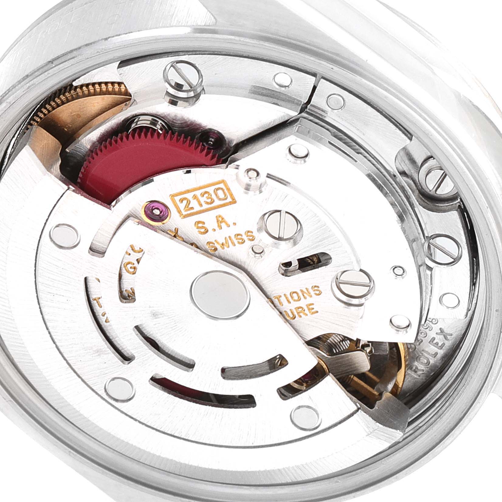 This close-up image shows the intricate movement mechanism of a Rolex Oyster Perpetual 67180 Women's Stainless Steel White Dial 67180 Women's Stainless Steel White Dial watch.