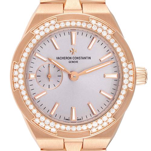 This image shows a frontal view of a Vacheron Constantin Overseas 2305V/100R-B07 Women's Rose Gold Pink Dial 2305V/100R-B07 Women's Rose Gold Pink Dial watch with a diamond-encrusted bezel and gold case.