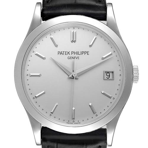 This image shows a front view of the Calatrava model by Patek Philippe, highlighting its silver dial, hands, markers, date window, and black leather strap.