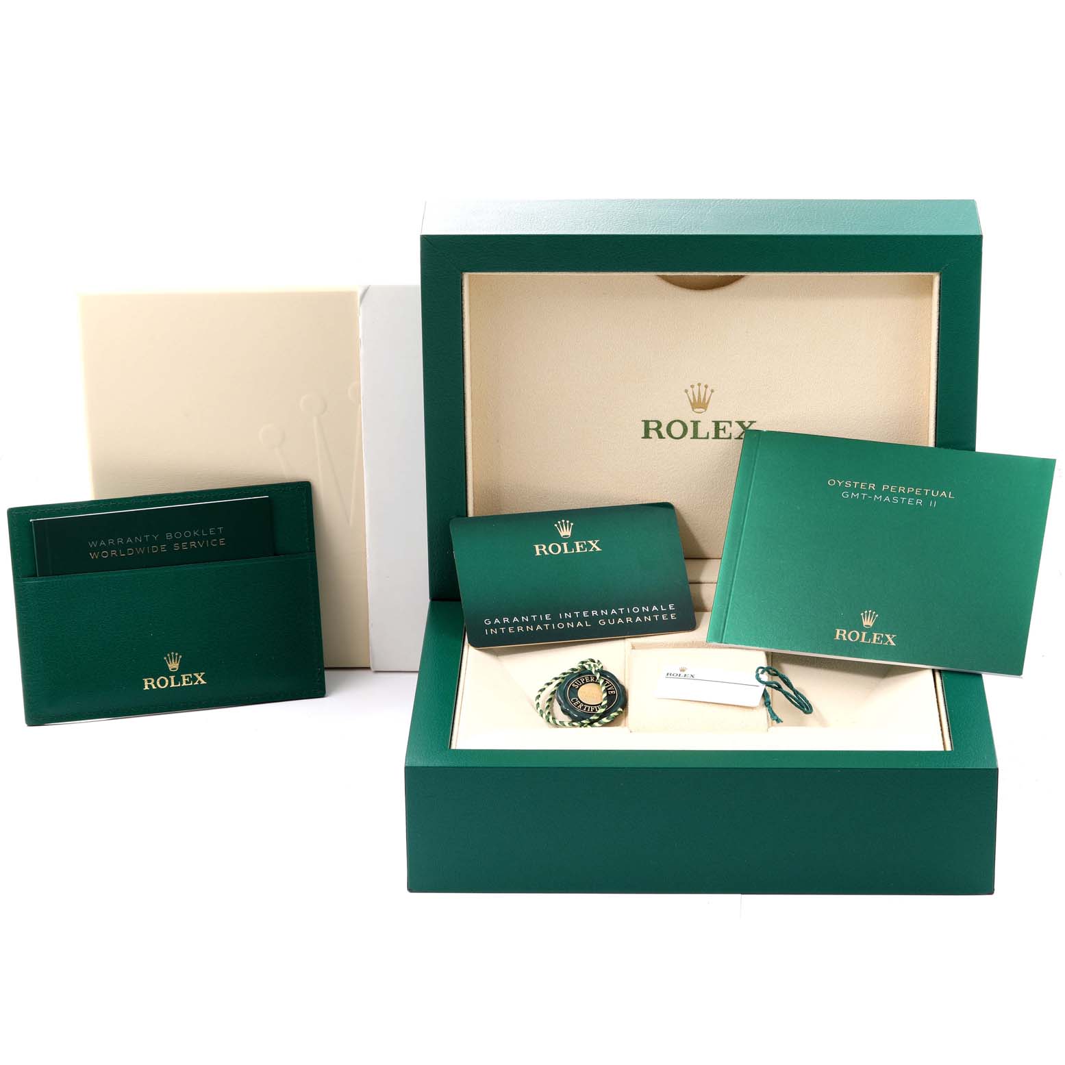 This image shows the box and accessories of a Rolex GMT-Master 126715CHNR Men's Rose Gold Black Dial 126715CHNR Men's Rose Gold Black Dial watch, including booklets, a tag, and a warranty card.