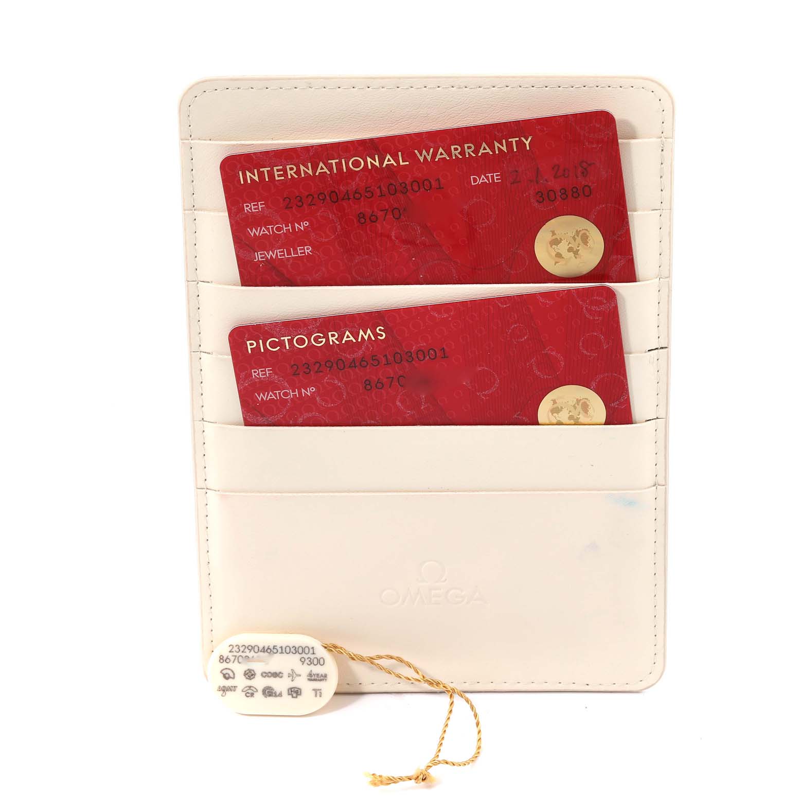 The image shows International Warranty and Pictograms cards for the Omega Planet Ocean 232.90.46.51.03.001 Men's Titanium Blue Dial 232.90.46.51.03.001 Men's Titanium Blue Dial watch, along with a tag, inside a cardholder.