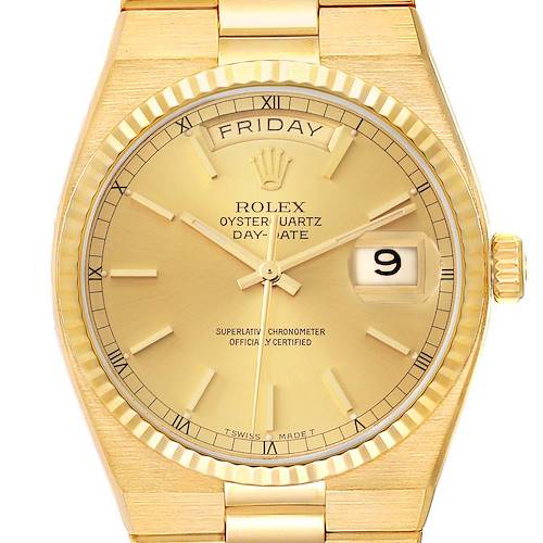 This image shows a frontal view of a Rolex Oysterquartz 19018 Men's Yellow Gold Champagne Dial 19018 Men's Yellow Gold Champagne Dial Day-Date watch, highlighting the face, hands, and day/date indicators.