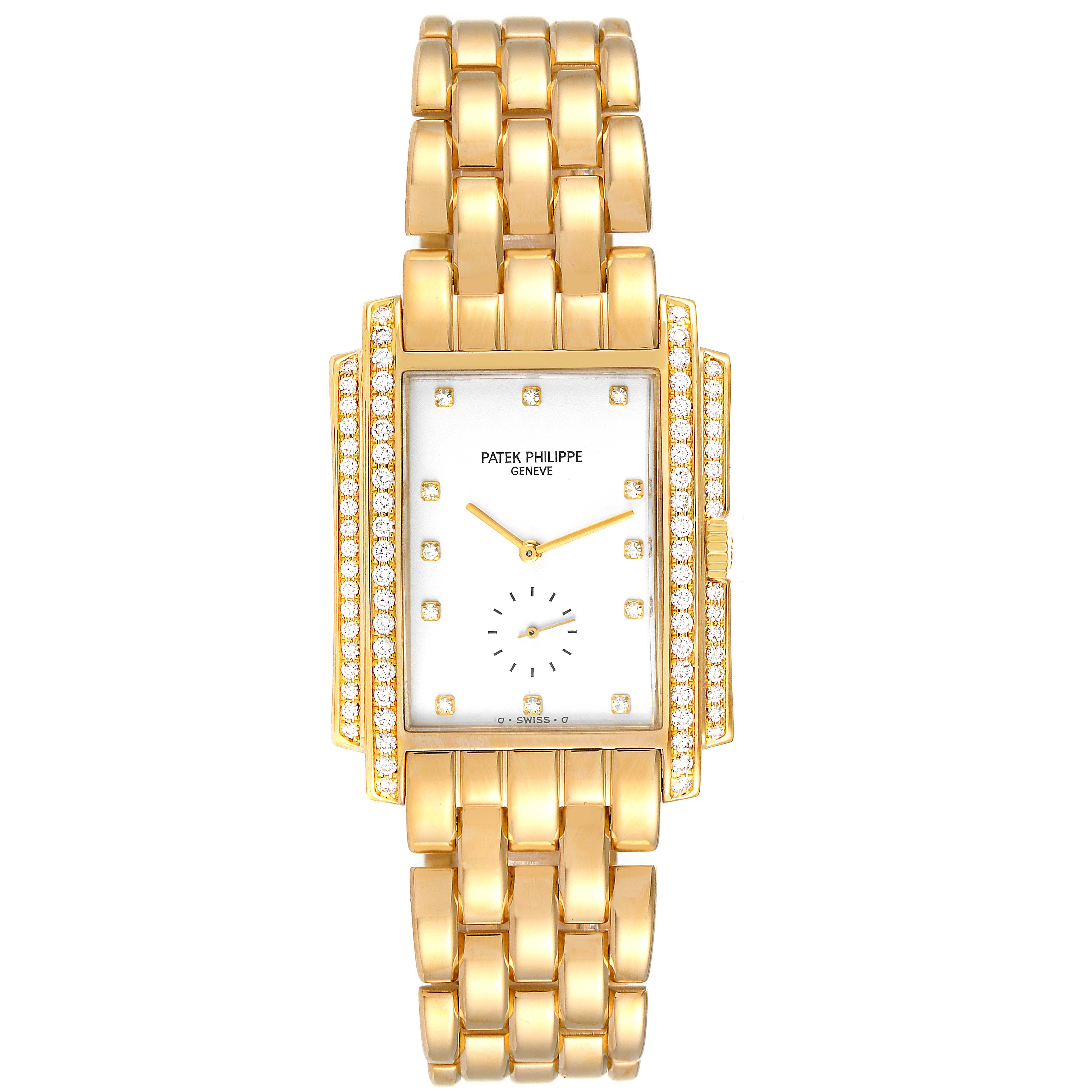 The Patek Philippe Gondolo 5025J Men's Yellow Gold White Dial 5025J Men's Yellow Gold White Dial watch is shown from a front angle, displaying its gold band, diamond-studded rectangular case, and dial.