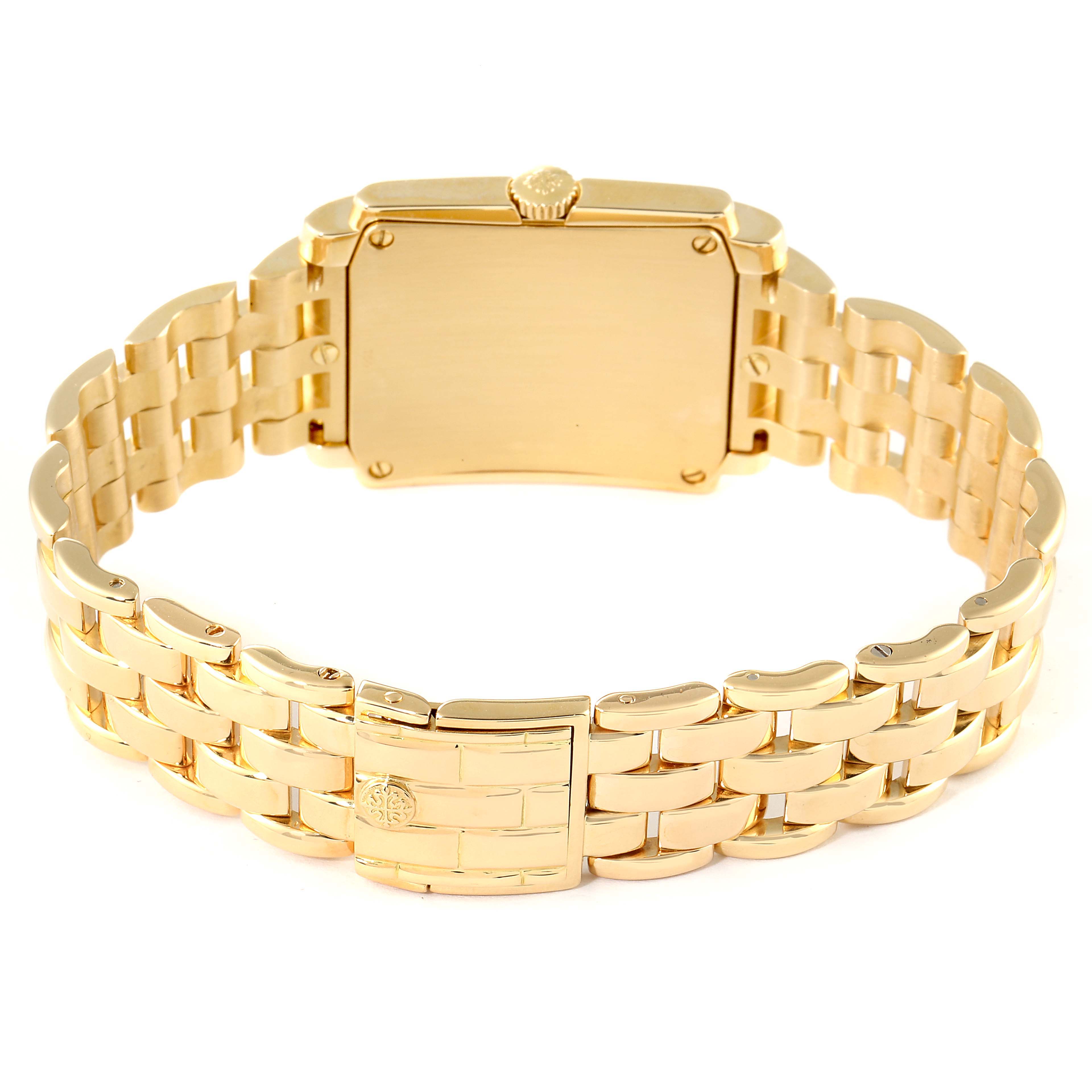 The image shows the back view of a Patek Philippe Gondolo 5025J Men's Yellow Gold White Dial 5025J Men's Yellow Gold White Dial watch and its gold bracelet.