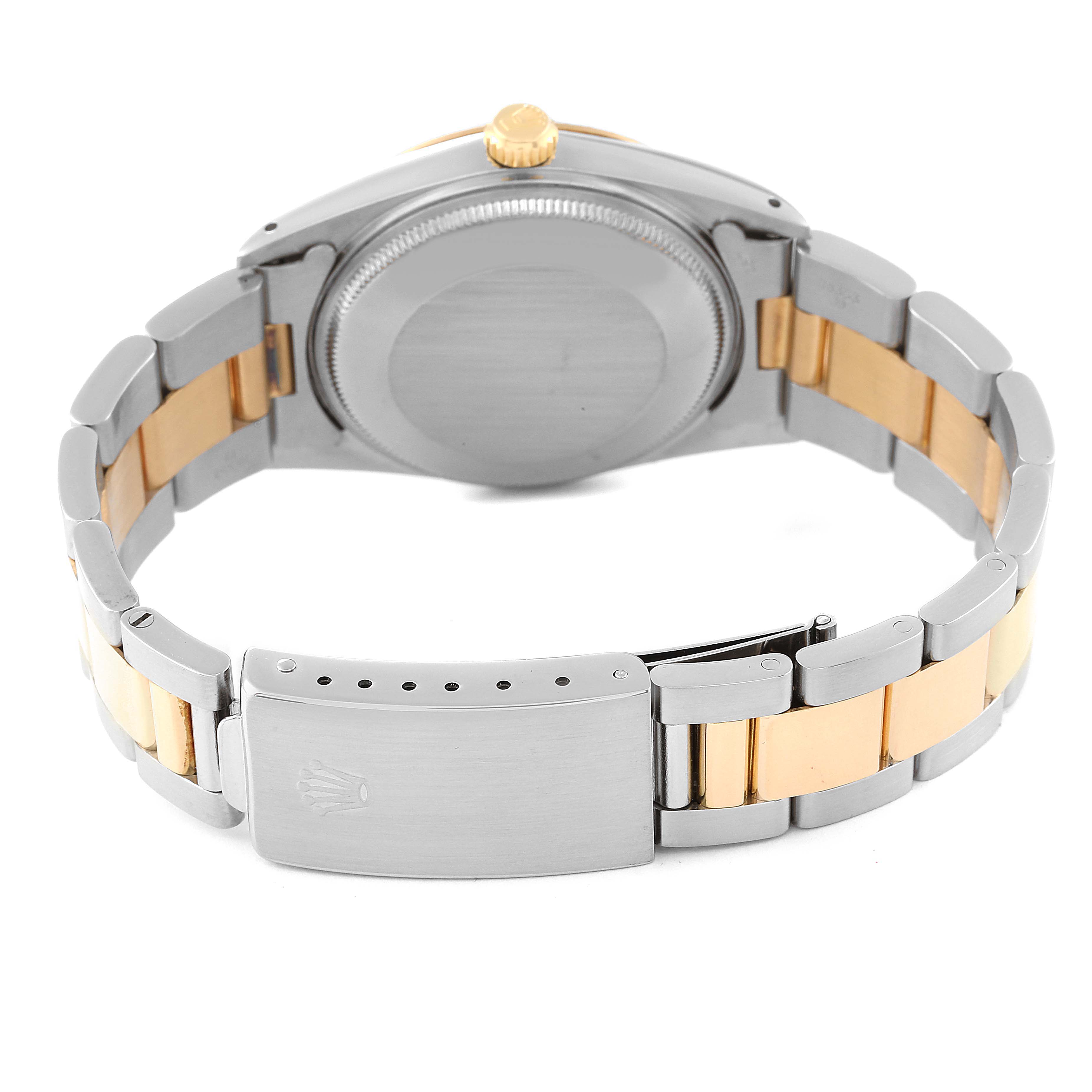 The image shows the back view of a Rolex Date 15053 Men's Steel and Gold (two tone) Champagne Dial 15053 Men's Steel and Gold (two tone) Champagne Dial watch, highlighting the clasp and bracelet.