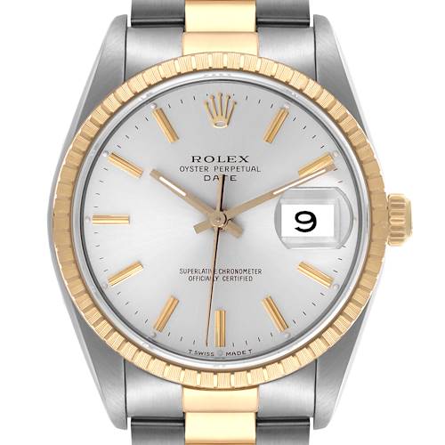 The Rolex Date 15223 Men's Steel and Gold (two tone) Silver Dial 15223 Men's Steel and Gold (two tone) Silver Dial model is shown from a front angle, highlighting the silver dial, gold fluted bezel, and date window.