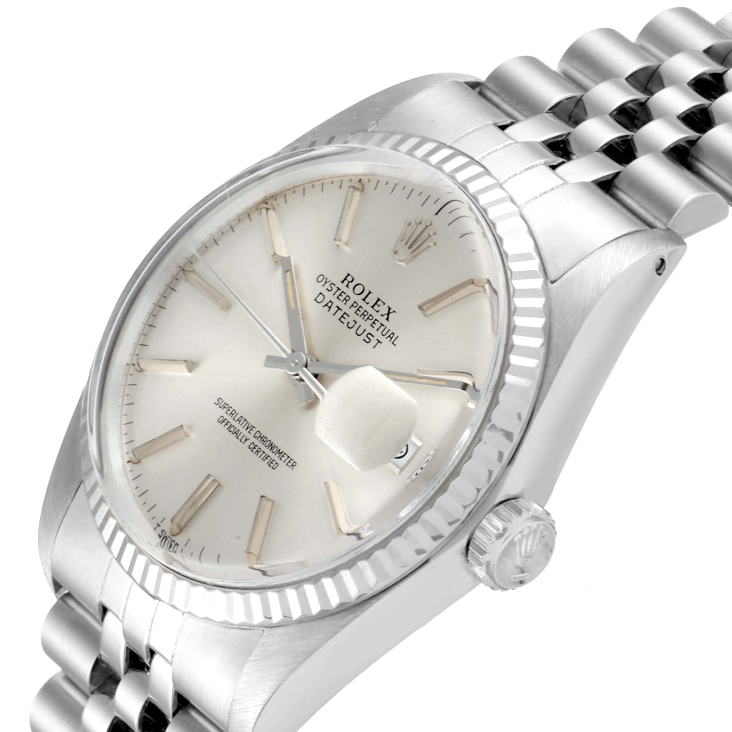 This image displays a Rolex Vintage Collection 16014 Men's Stainless Steel Silver Dial 16014 Men's Stainless Steel Silver Dial Datejust watch at an angled close-up, highlighting the face, bezel, crown, and part of the bracelet.
