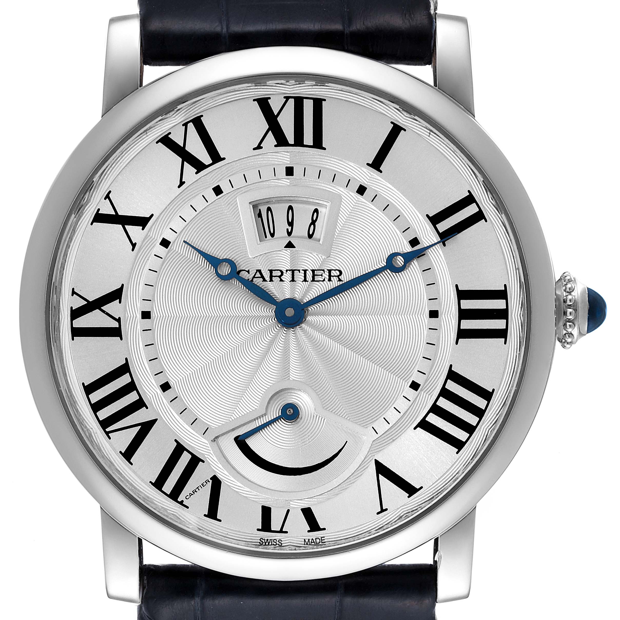 The image shows a frontal view of the Cartier Rotonde W1556369 Men's Stainless Steel Silver Dial W1556369 Men's Stainless Steel Silver Dial model watch, highlighting its Roman numerals, blue hands, and date display.