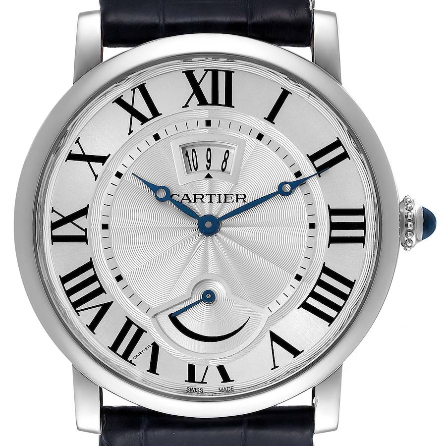 The image shows a frontal view of the Cartier Rotonde W1556369 Men's Stainless Steel Silver Dial W1556369 Men's Stainless Steel Silver Dial model watch, highlighting its Roman numerals, blue hands, and date display.
