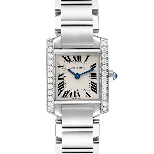 The image shows a top view of a Cartier Tank Française watch with a silver bracelet and diamond accents on the bezel.