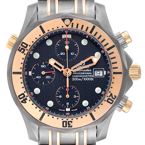 The image shows a front view of the Omega Seamaster 2296.80.00 Men's Steel and Gold (two tone) Blue Dial 2296.80.00 Men's Steel and Gold (two tone) Blue Dial watch, highlighting its dial, bezel, pushers, and part of the bracelet.